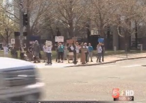 Picketers protest against the Grand Junction Area Chamber's support of woman abuser and then-city council member-elect Rick Brainard (Photo credit: KREX-TV)
